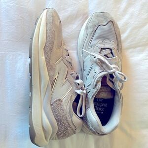 New Balance 574 Men’s Sneaker in light tan. Size 9.5. Gently worn.